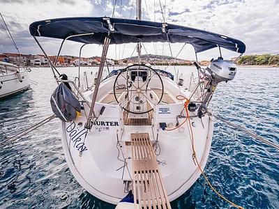 Exterior view of Dolkar, a Bavaria Cruiser 36 sailboat at Betina, Croatia