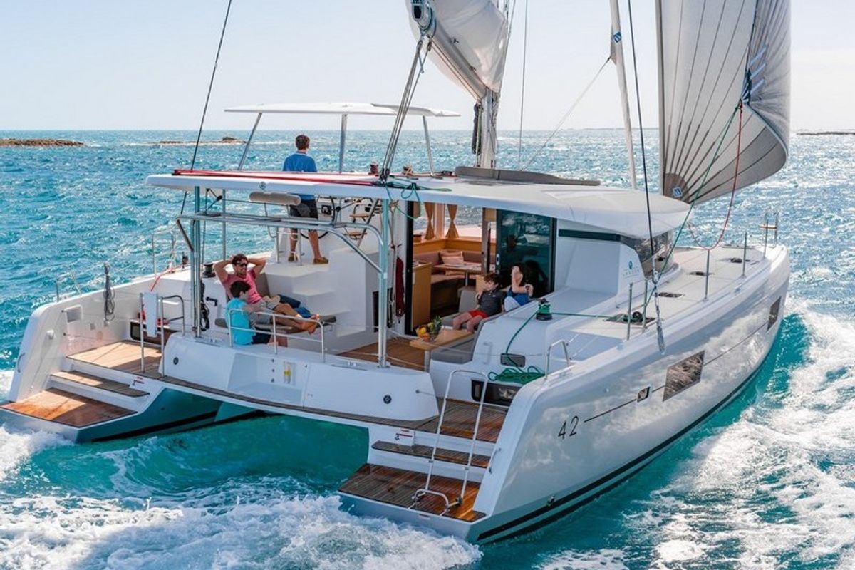 Exterior view of Synchronicity, a Lagoon 42 catamaran at Papeete, France
