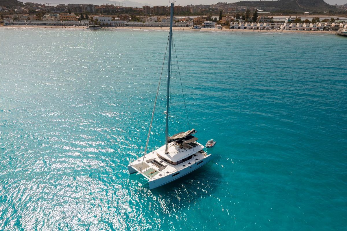 Exterior view of Taipan, a Lagoon 560 catamaran at Olbia, Italy