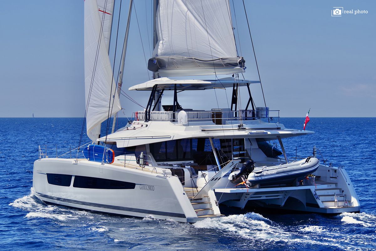 Exterior view of Maurice, a Fountaine Pajot Samana 59 catamaran at Cannigione, Italy