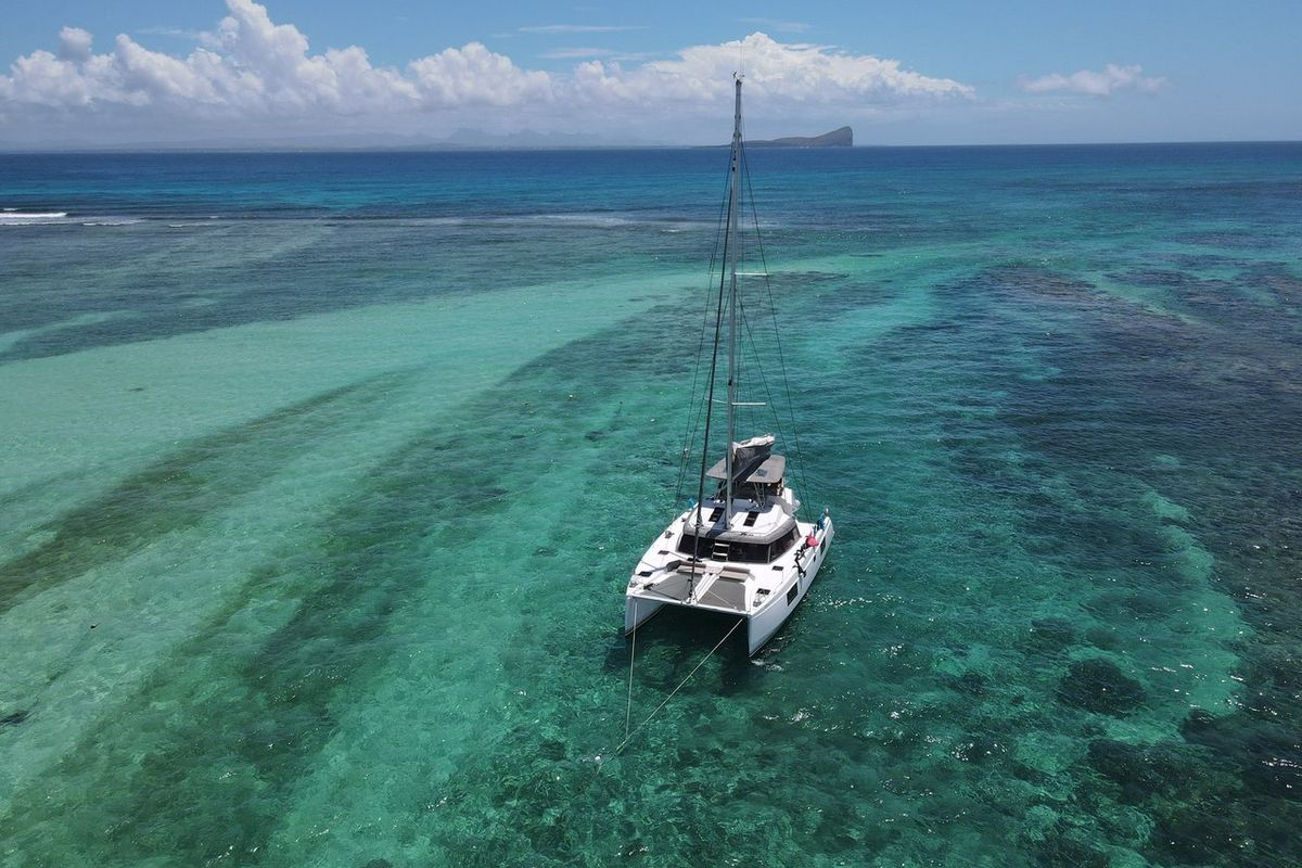 Exterior view of Sea Spirit II, a Nautitech Rochefort Nautitech 46 Fly catamaran at Grande Rivière Noire VCA, Mauritius