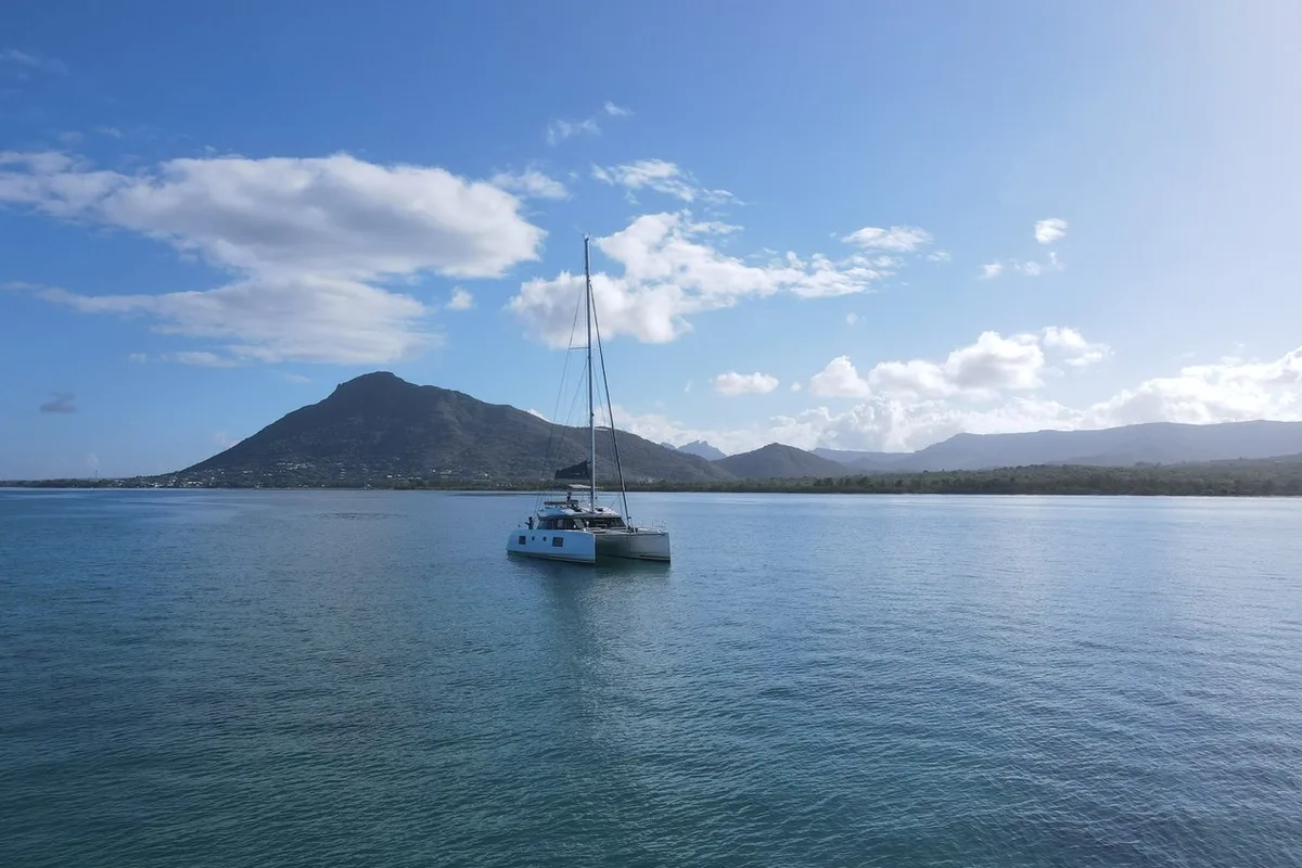 Exterior view of Sea Spirit II, a Nautitech Rochefort Nautitech 46 Fly catamaran at Grande Rivière Noire VCA, Mauritius