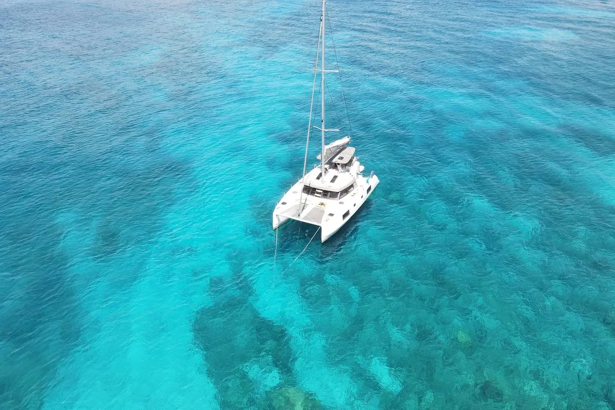 Exterior view of Sea Spirit II, a Nautitech Rochefort Nautitech 46 Fly catamaran at Grande Rivière Noire VCA, Mauritius