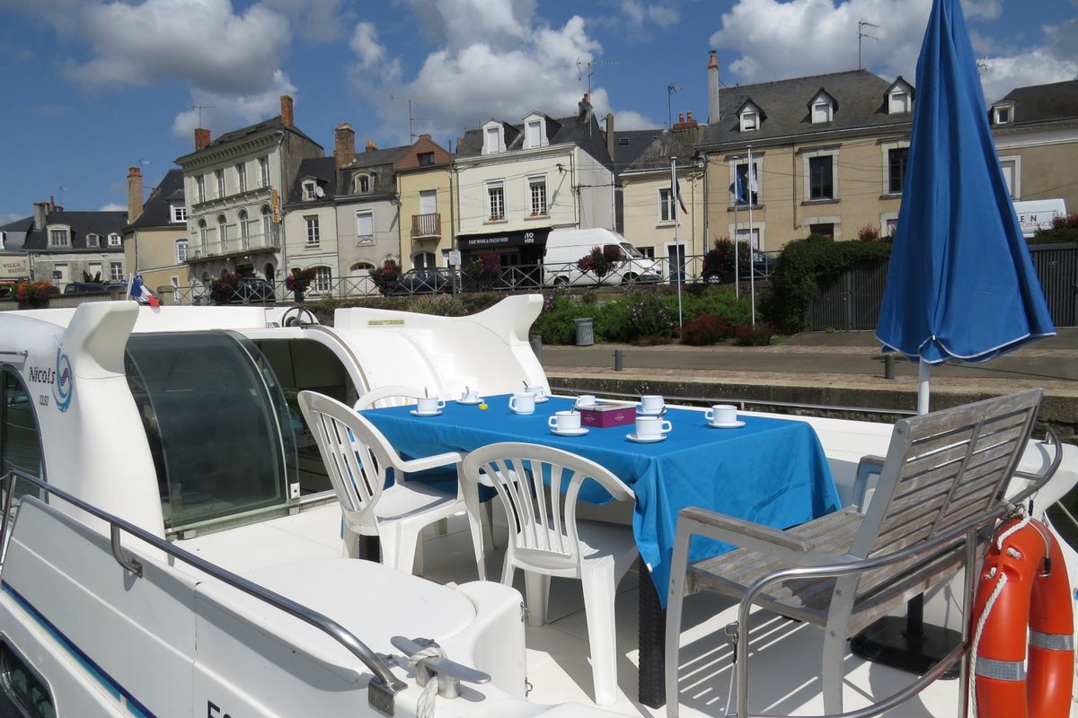Deck of Magnificat, a Nicols Confort 1350 motorboat at Sablé-sur-Sarthe, France