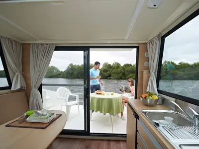 Salon of Cantate, a Nicols Sedan Primo motorboat at Grez-Neuville, France
