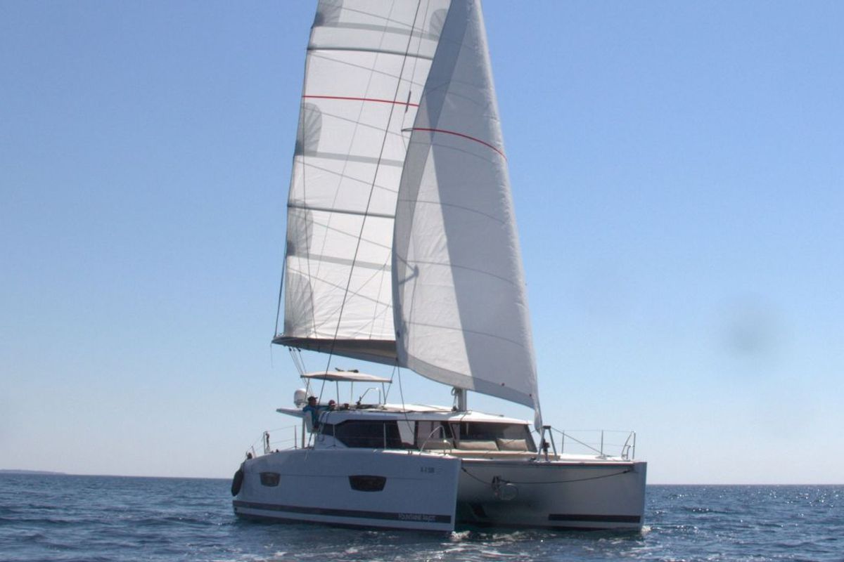 Exterior view of Luna Rossa II, a Fountaine Pajot Lucia 40 catamaran at Punat, Croatia