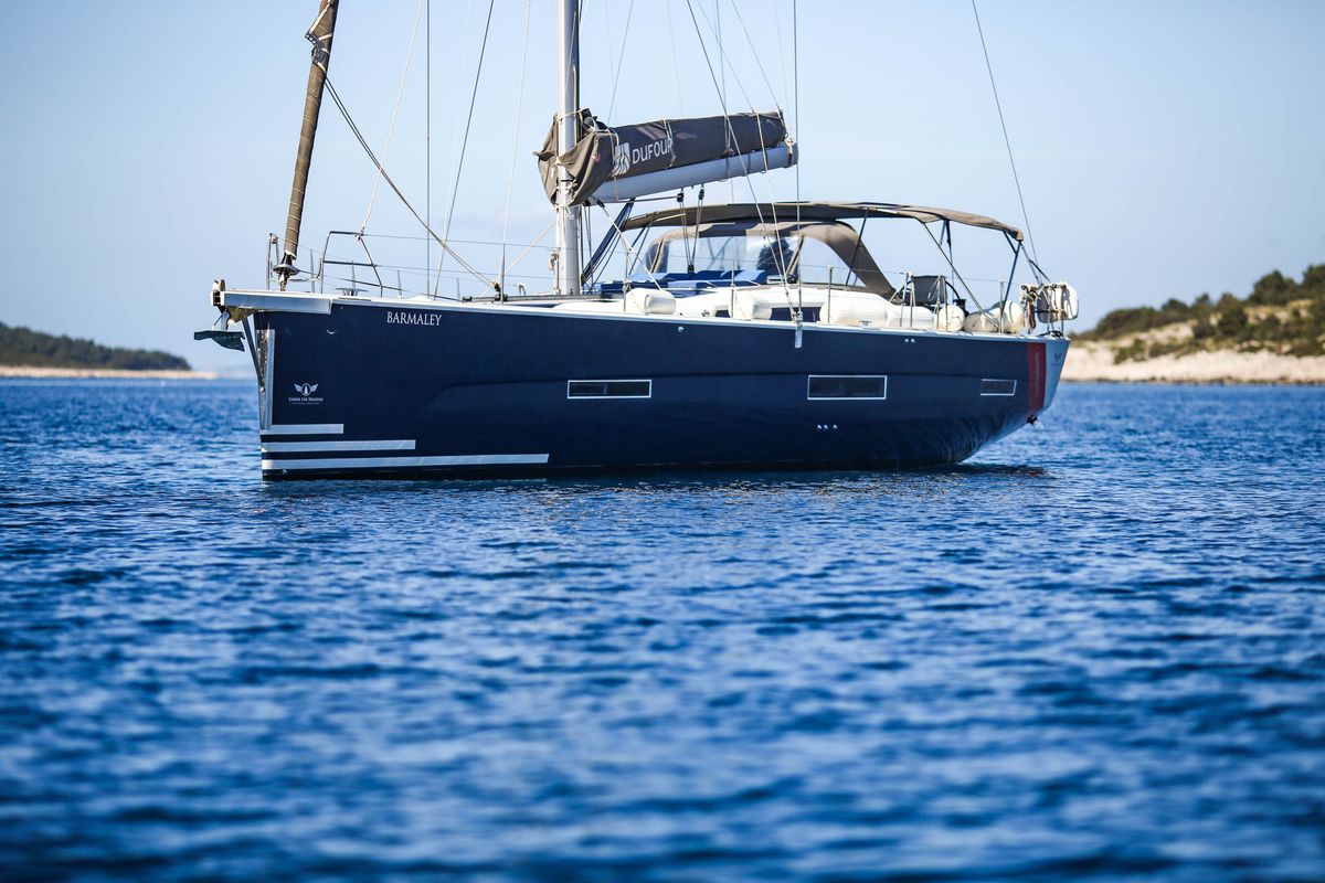 Exterior view of Barmaley, a Dufour 56 Exclusive sailboat at Primošten, Croatia