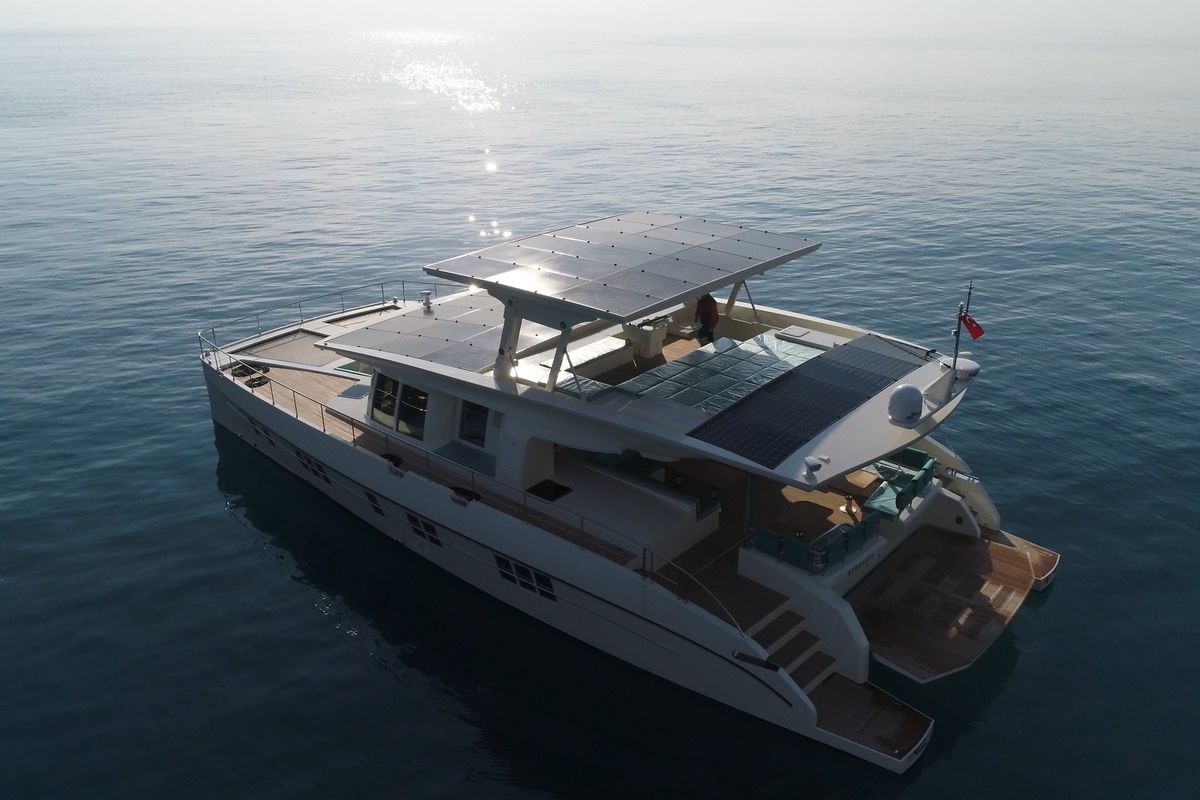 Exterior view of Premium +, a Gulet Serenity 64 catamaran at Sant Antoni de Portmany, Spain