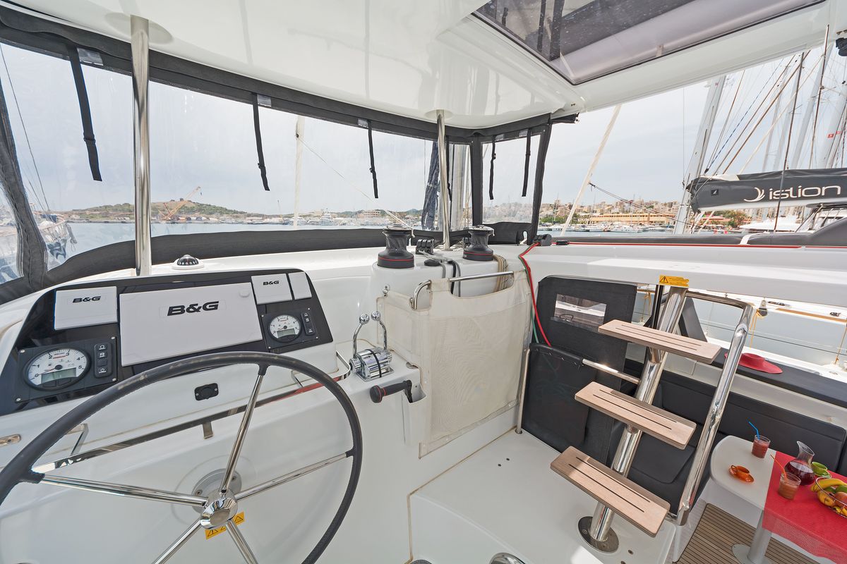 Cockpit of Deja Vu, a Lagoon 42 catamaran at Lavreotiki Municipal Unit, Greece