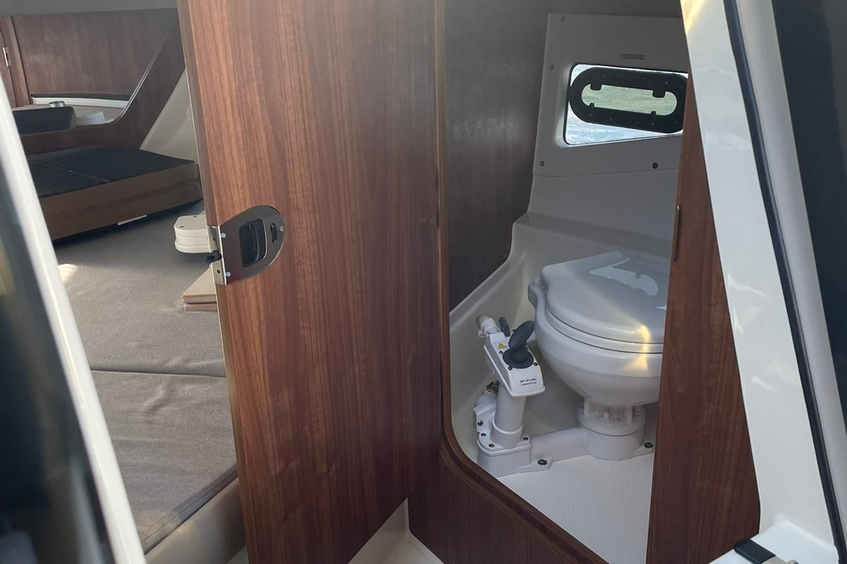 Head on Pure Pleasure, a Quicksilver Activ 755 CR motorboat at Tribunj, Croatia