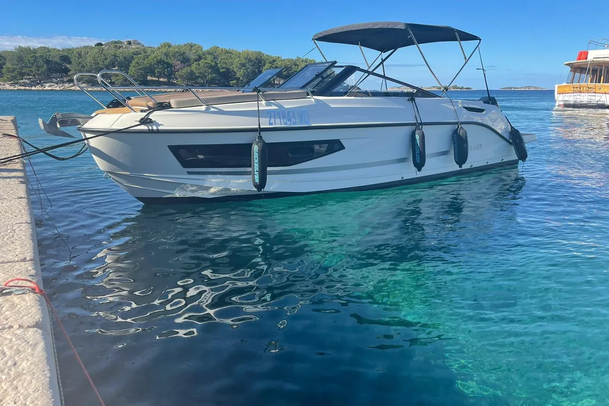 Exterior view of Pure Pleasure, a Quicksilver Activ 755 CR motorboat at Tribunj, Croatia