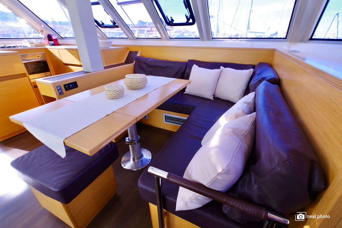 Salon of Gelmar, a Nautitech 46 Fly catamaran at Cannigione, Italy
