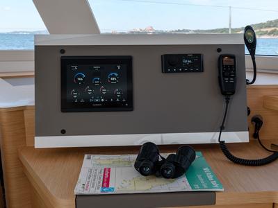 Cockpit of Agitation - A/C, Generator, Water maker. Solar panel, a Fountaine Pajot Astréa 42 catamaran at Cannigione, Italy