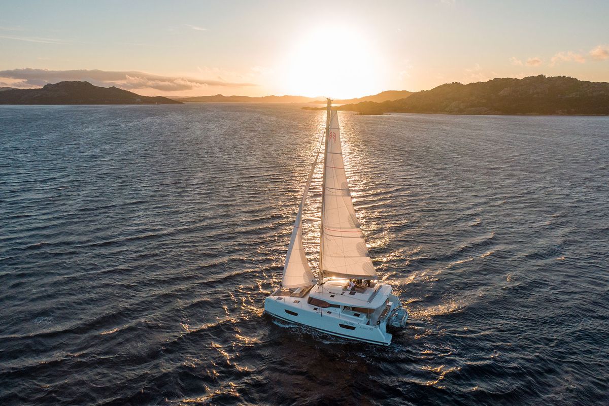 Exterior view of Agitation - A/C, Generator, Water maker. Solar panel, a Fountaine Pajot Astréa 42 catamaran at Cannigione,…