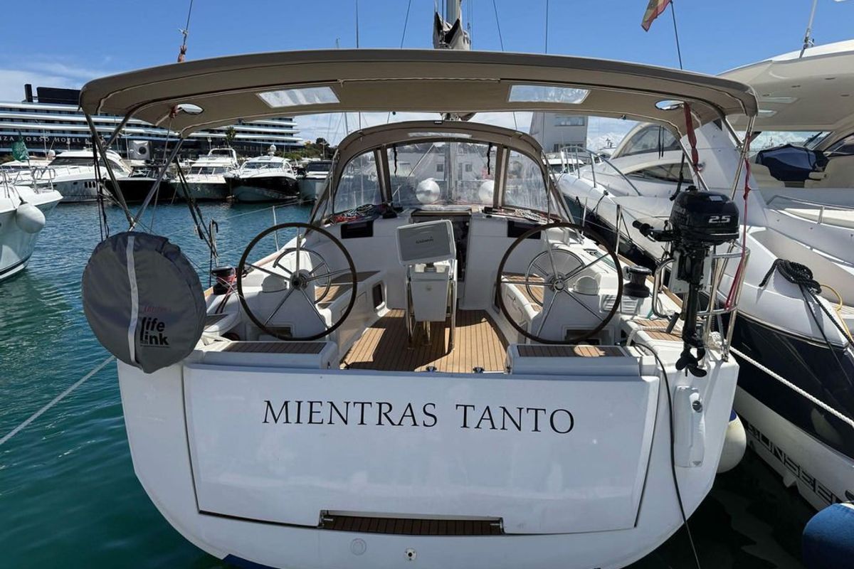 Exterior view of Mientras Tanto, a Jeanneau Sun Odyssey 449 sailboat at Ibiza, Spain