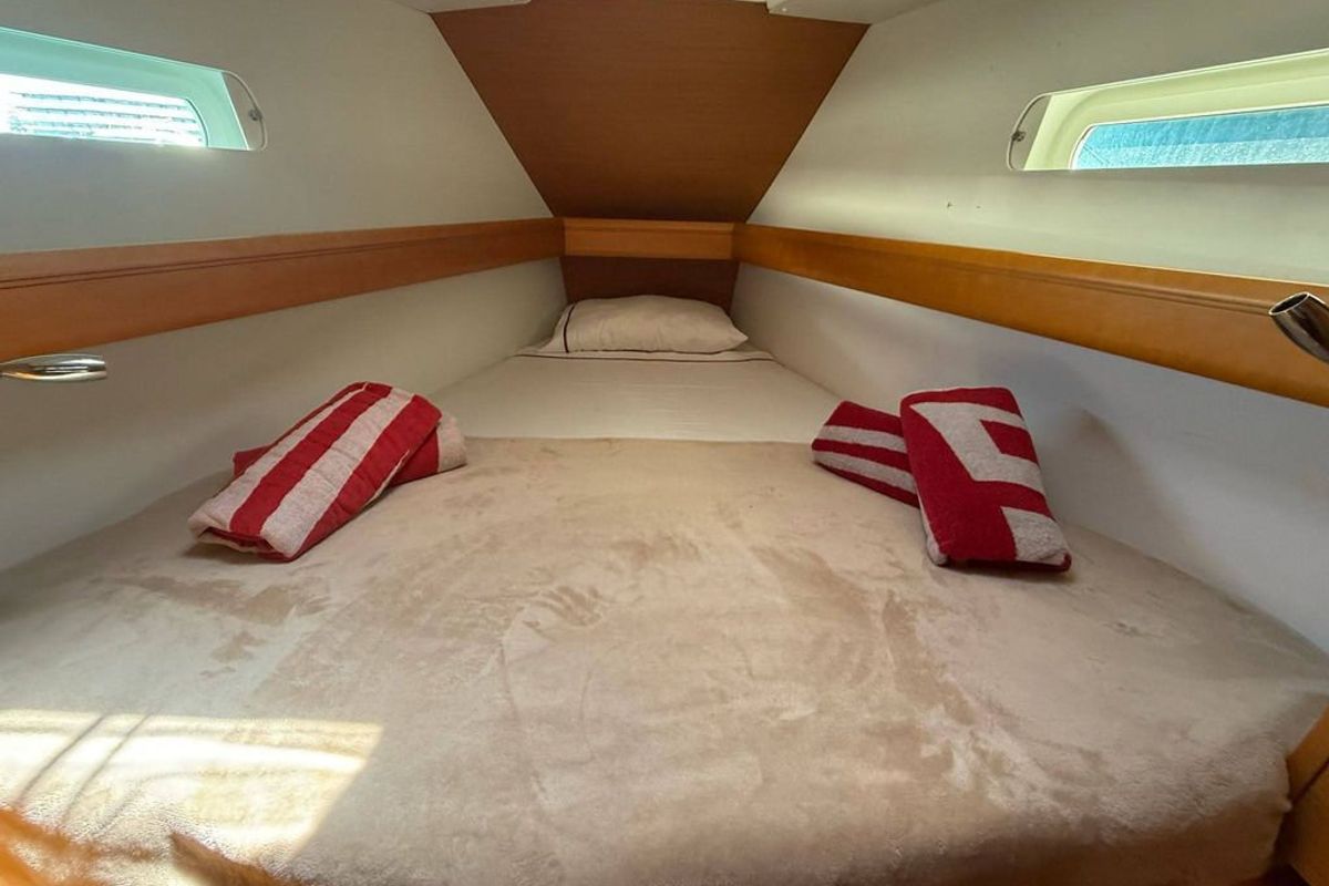 Cabin on Mientras Tanto, a Jeanneau Sun Odyssey 449 sailboat at Ibiza, Spain
