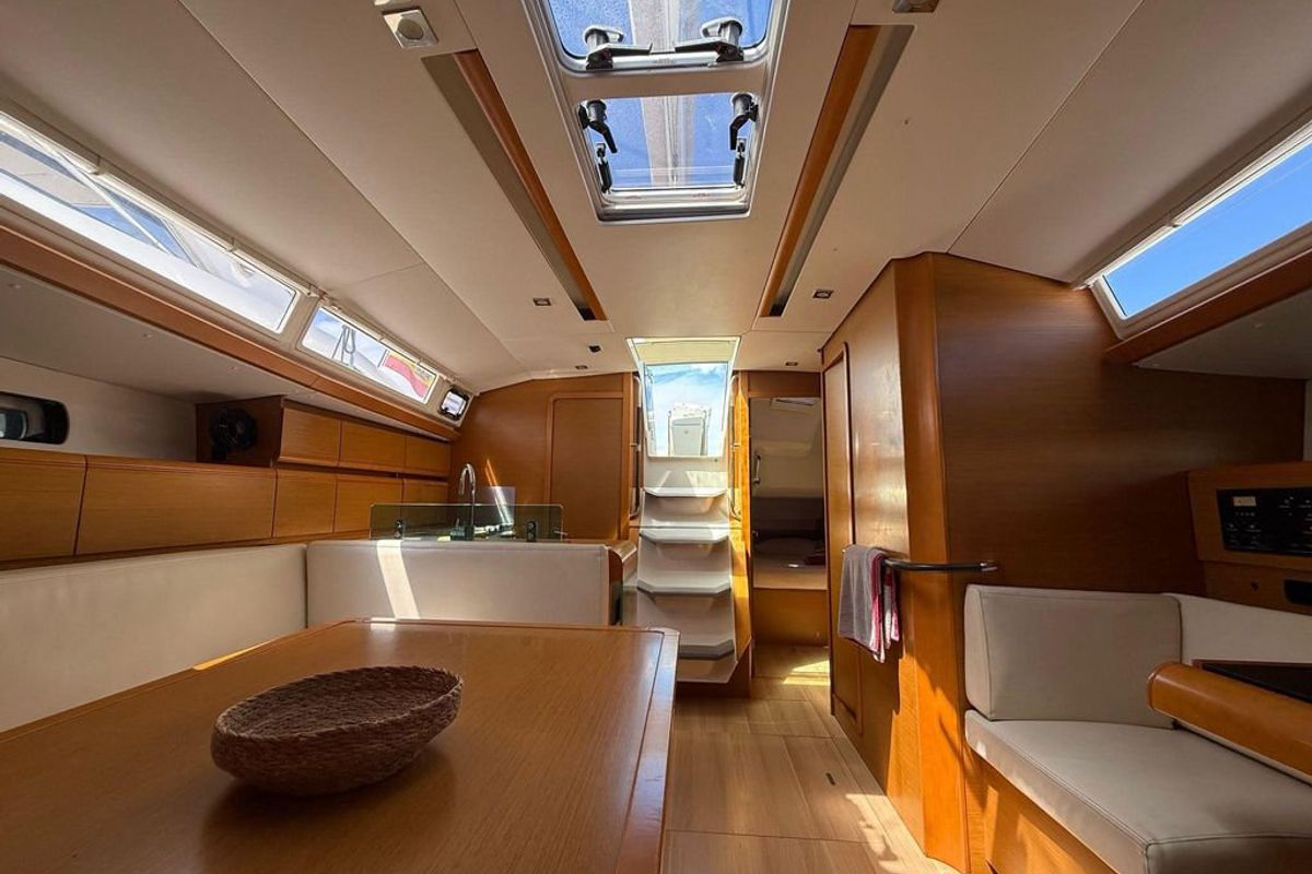Salon of Mientras Tanto, a Jeanneau Sun Odyssey 449 sailboat at Ibiza, Spain