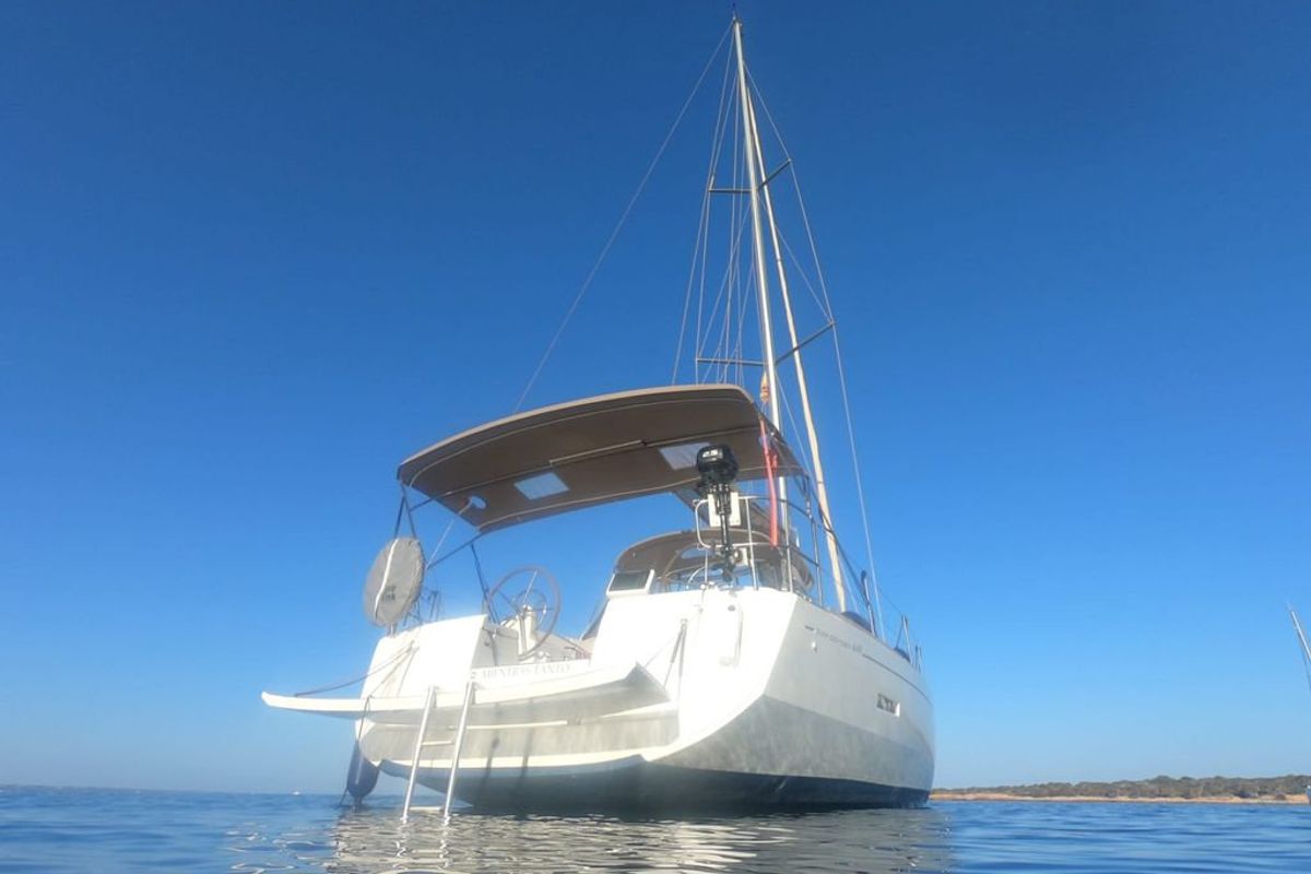 Exterior view of Mientras Tanto, a Jeanneau Sun Odyssey 449 sailboat at Ibiza, Spain