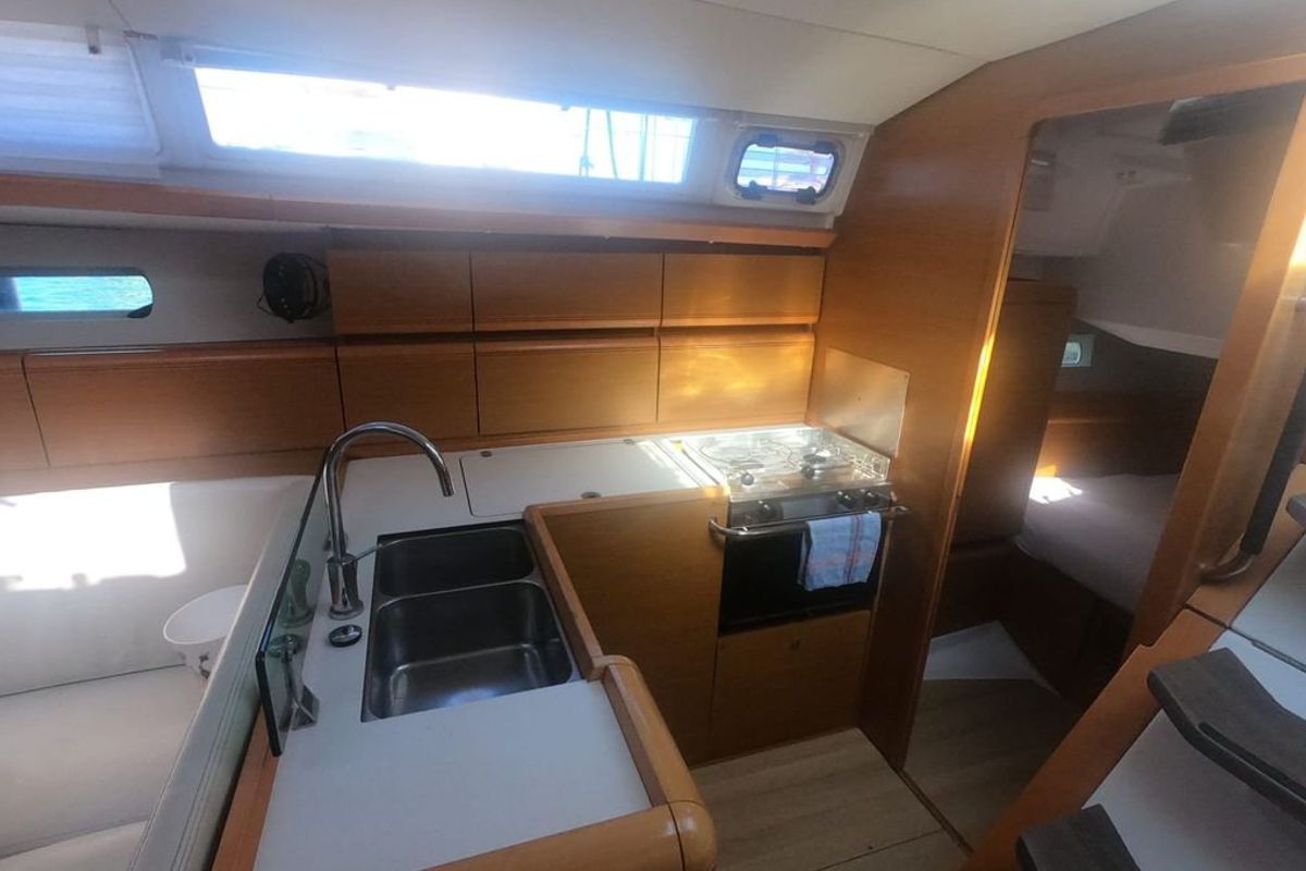 Galley of Mientras Tanto, a Jeanneau Sun Odyssey 449 sailboat at Ibiza, Spain