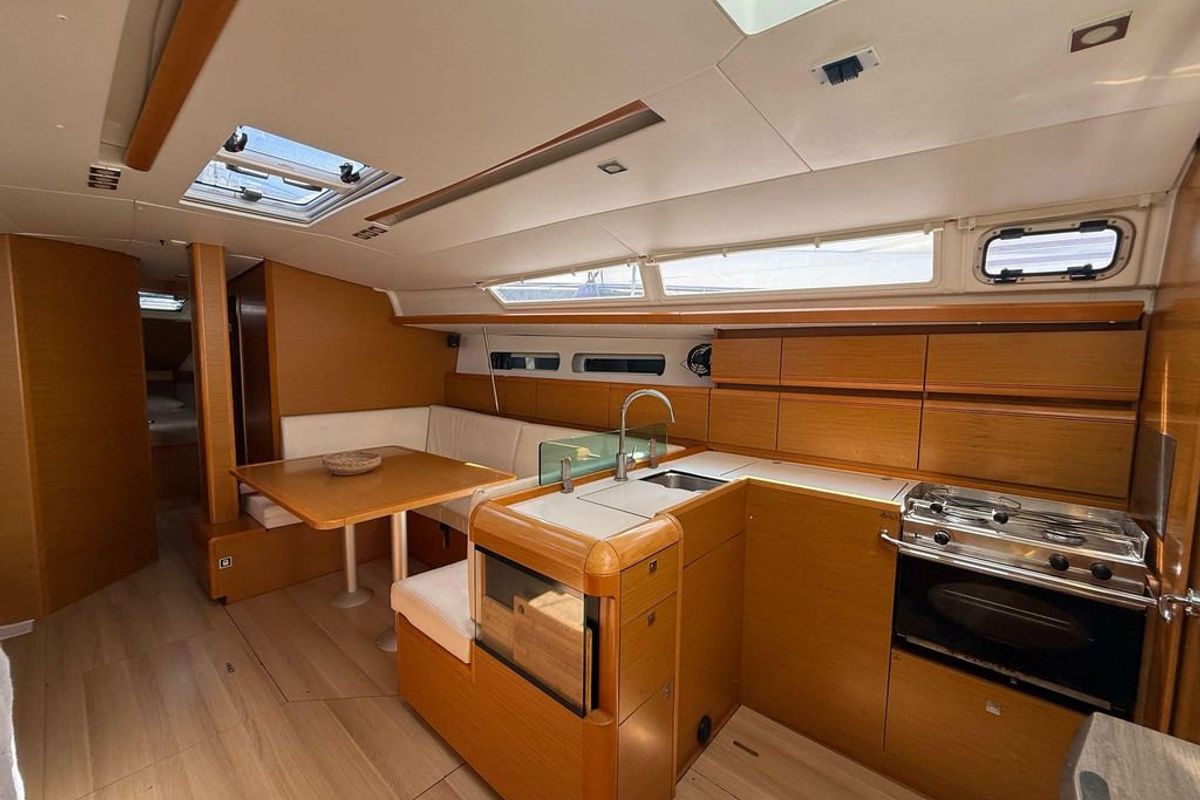 Salon of Mientras Tanto, a Jeanneau Sun Odyssey 449 sailboat at Ibiza, Spain