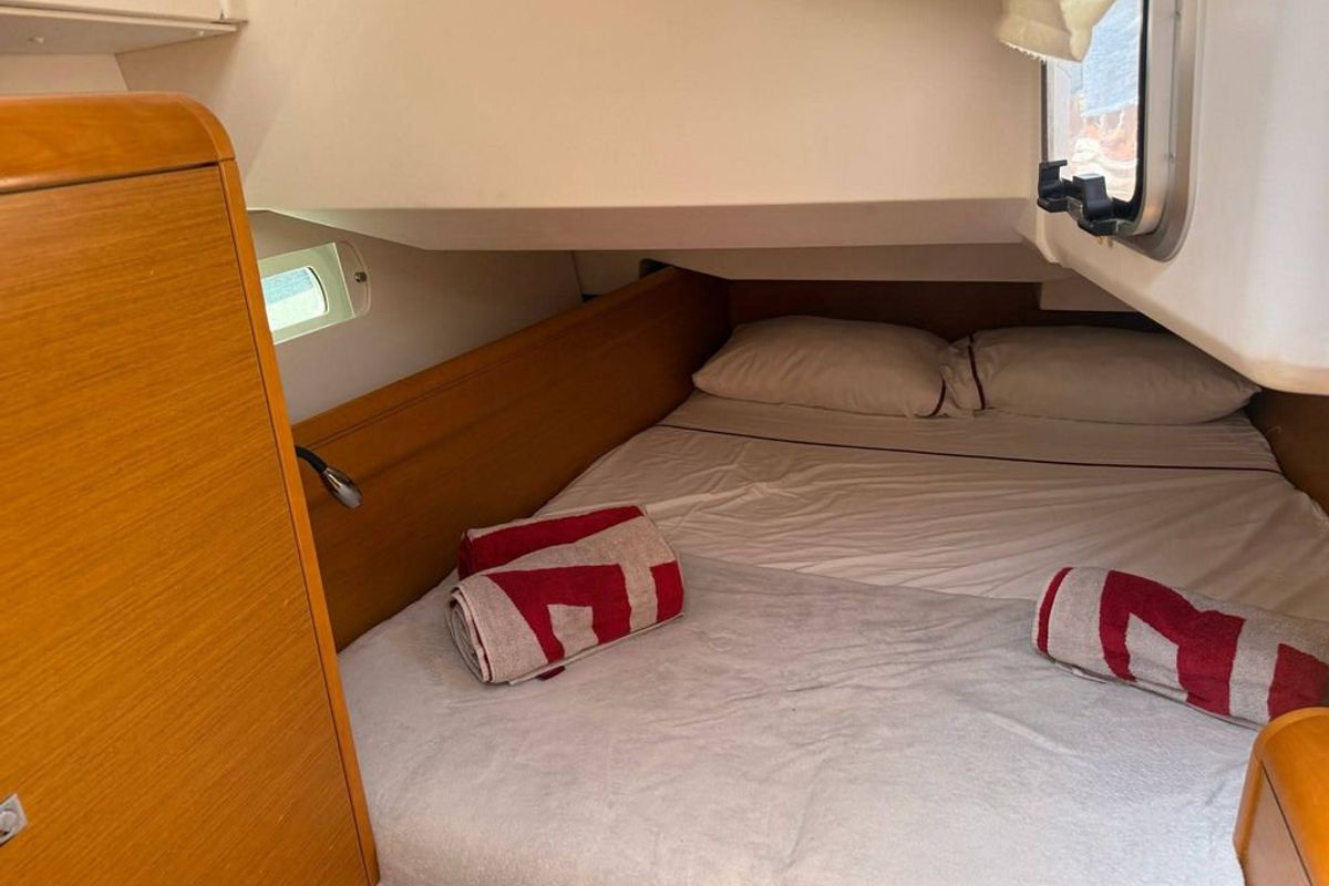 Cabin on Mientras Tanto, a Jeanneau Sun Odyssey 449 sailboat at Ibiza, Spain