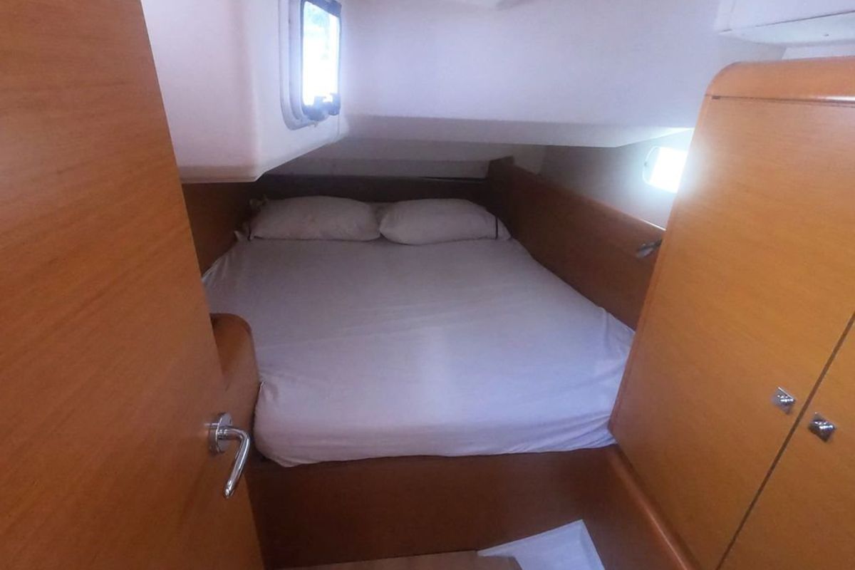 Cabin on Mientras Tanto, a Jeanneau Sun Odyssey 449 sailboat at Ibiza, Spain