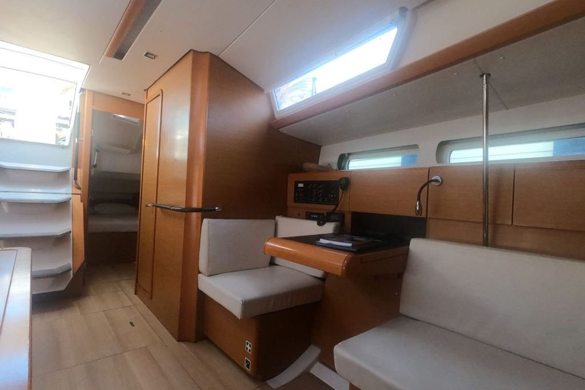 Salon of Mientras Tanto, a Jeanneau Sun Odyssey 449 sailboat at Ibiza, Spain