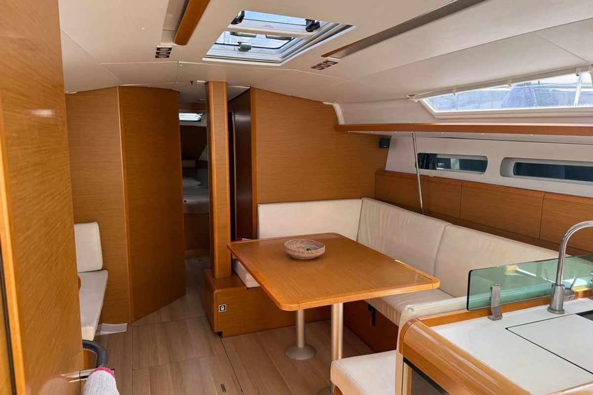 Salon of Mientras Tanto, a Jeanneau Sun Odyssey 449 sailboat at Ibiza, Spain