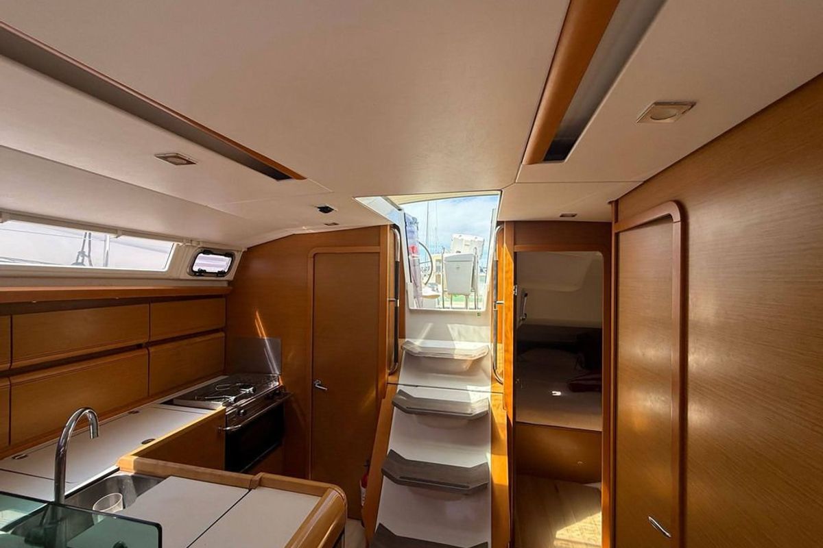 Cabin on Mientras Tanto, a Jeanneau Sun Odyssey 449 sailboat at Ibiza, Spain