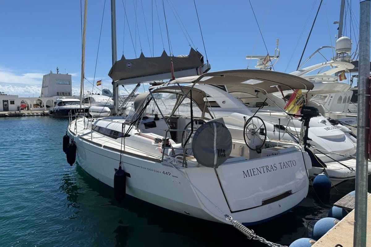 Head on Mientras Tanto, a Jeanneau Sun Odyssey 449 sailboat at Ibiza, Spain