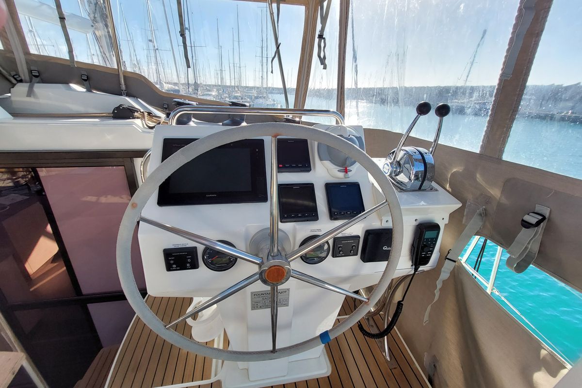 Cockpit of Ancora Reha, a Fountaine Pajot Saona 47 catamaran at Rosignano Solvay, Italy