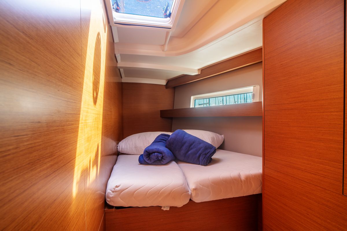 Cabin on Malala, a Jeanneau Sun Odyssey 440 sailboat at Olbia, Italy