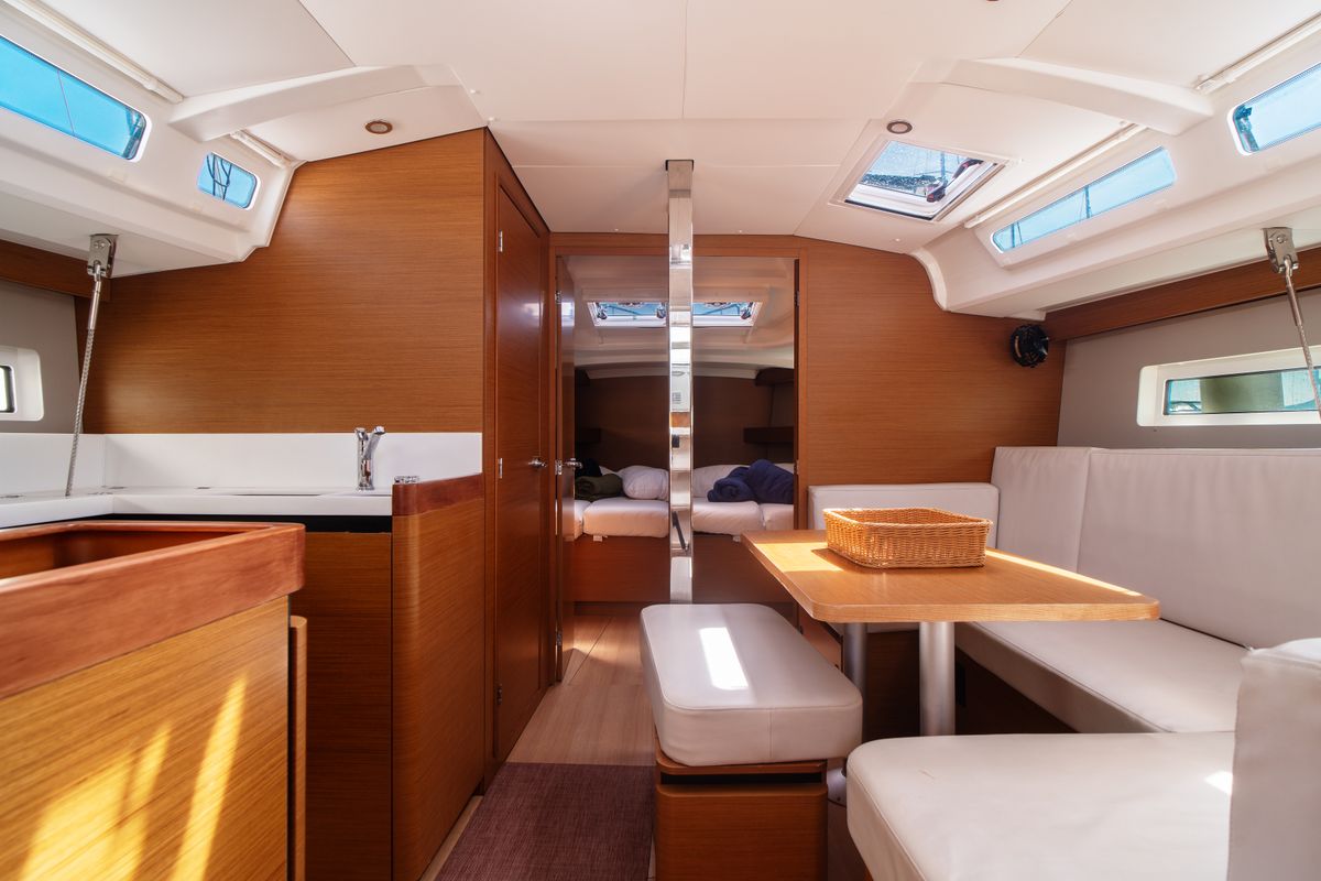 Salon of Malala, a Jeanneau Sun Odyssey 440 sailboat at Olbia, Italy