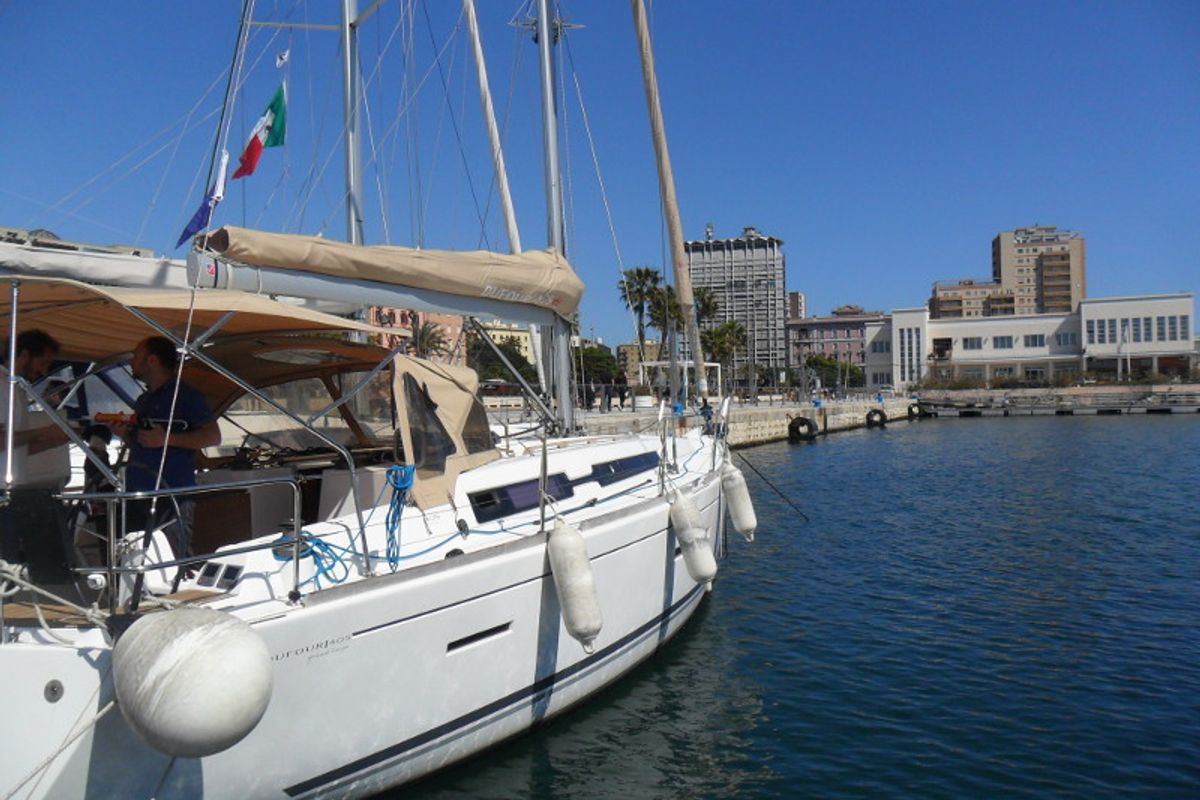 Exterior view of Chioggia Minuddaa, a Dufour 405 sailboat at U Pàize/Carloforte, Italy