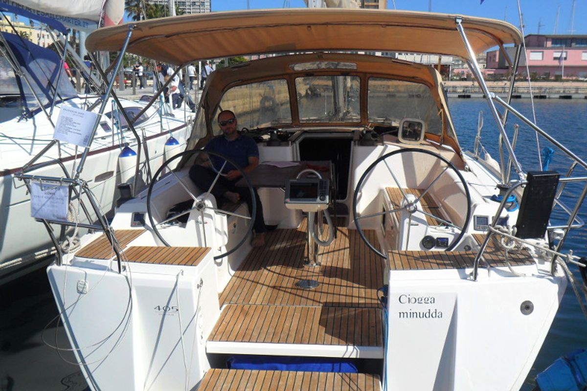 Cockpit of Chioggia Minuddaa, a Dufour 405 sailboat at U Pàize/Carloforte, Italy