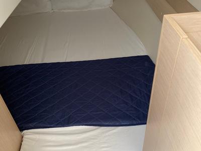 Cabin on Carina, a Beneteau Oceanis 30.1 sailboat at Olbia, Italy