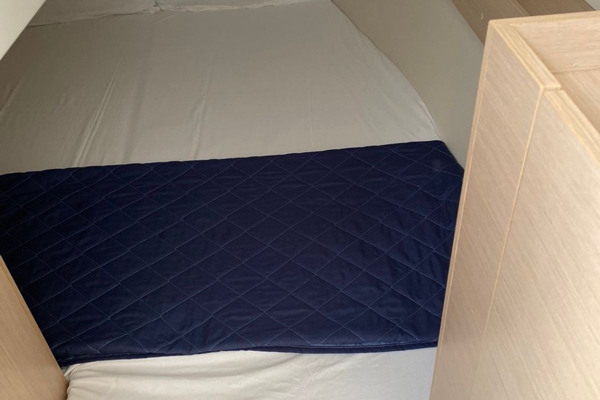 Cabin on Carina, a Beneteau Oceanis 30.1 sailboat at Olbia, Italy