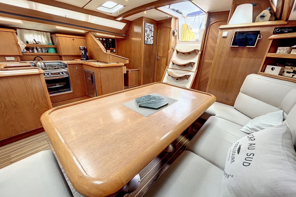 Salon of Slow, a Jeanneau Sun Odyssey 52.2 sailboat at Roses, Spain