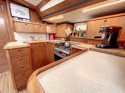 Galley of Slow, a Jeanneau Sun Odyssey 52.2 sailboat at Roses, Spain