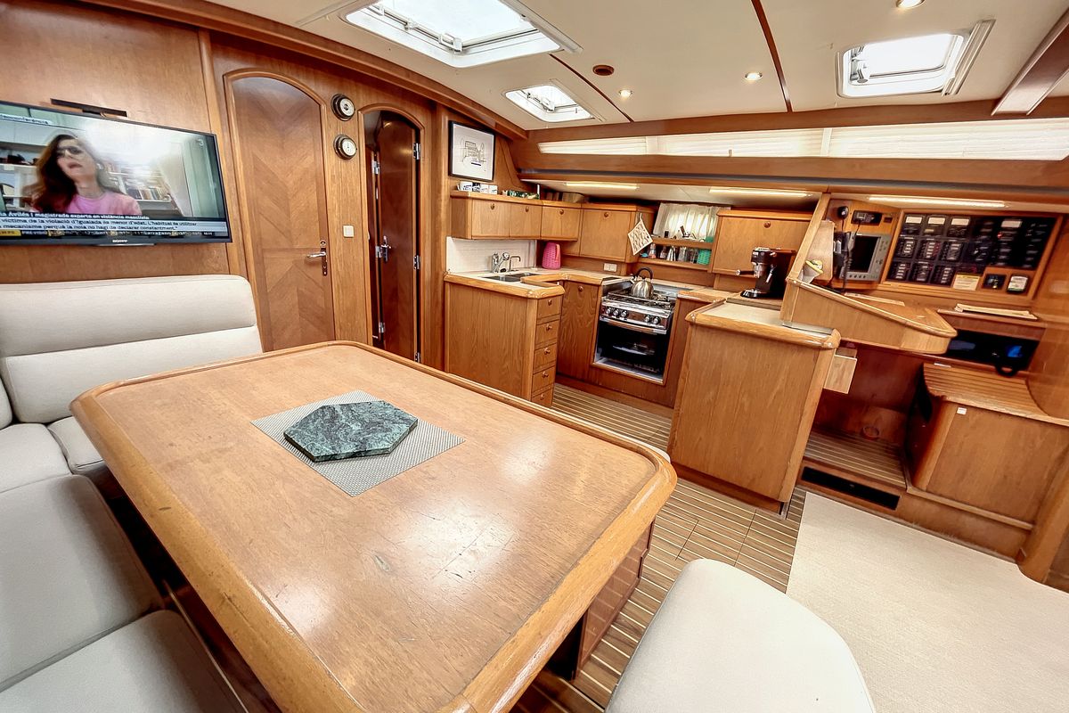 Salon of Slow, a Jeanneau Sun Odyssey 52.2 sailboat at Roses, Spain