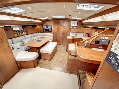 Salon of Slow, a Jeanneau Sun Odyssey 52.2 sailboat at Roses, Spain