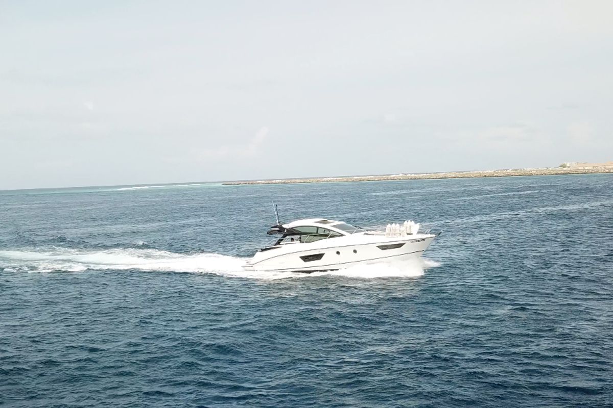 Exterior view of Island Cruise, a Beneteau GT40 motorboat at Malé, Maldives