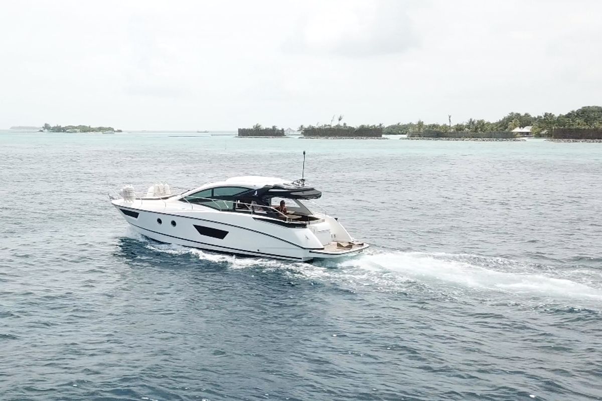 Exterior view of Island Cruise, a Beneteau GT40 motorboat at Malé, Maldives