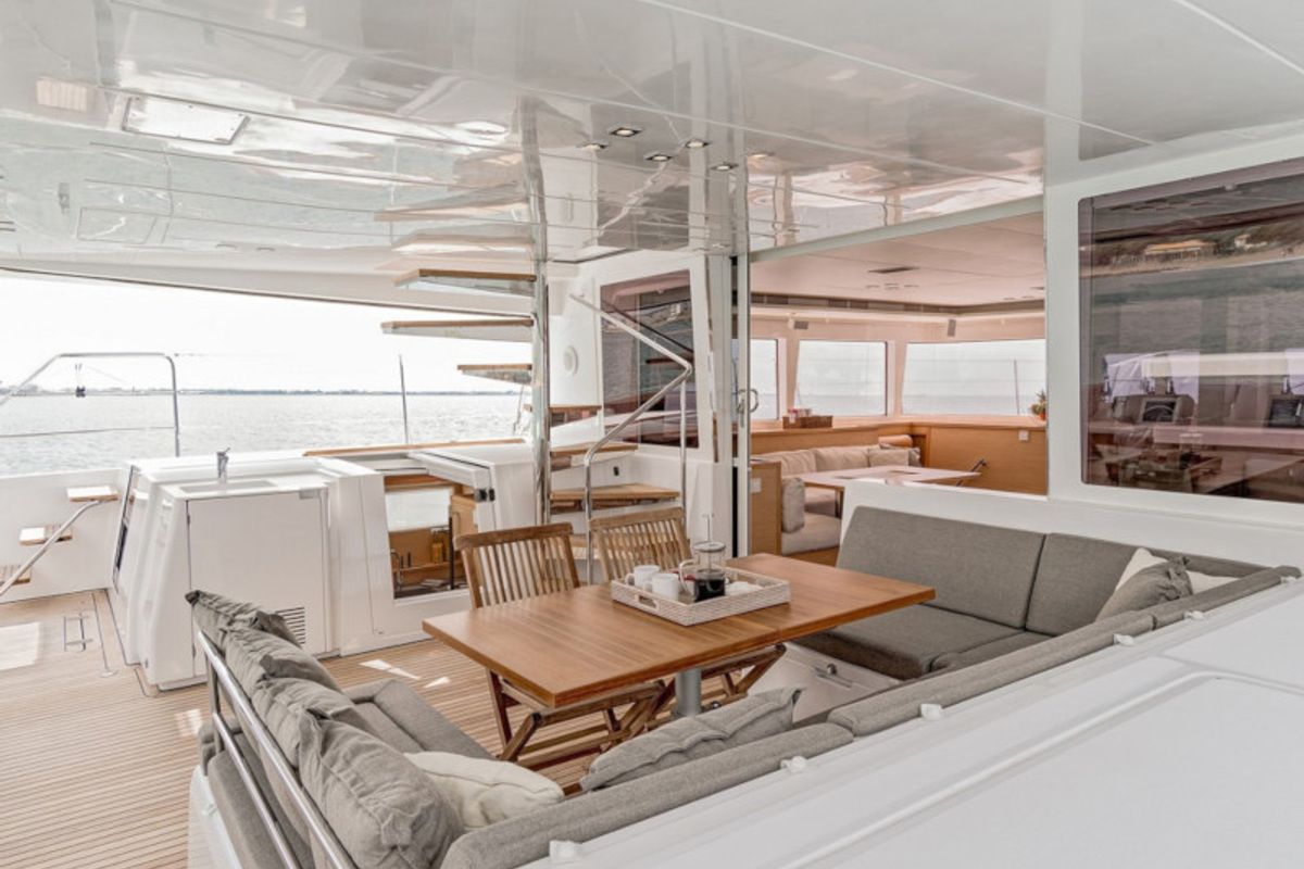 Exterior view of Daddy's Hobby, a Lagoon 560 catamaran at Lavreotiki Municipal Unit, Greece