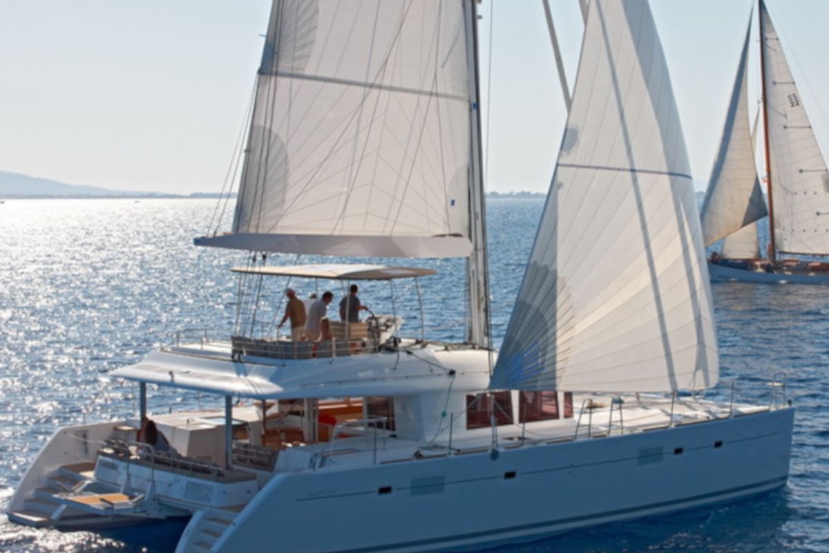Exterior view of Daddy's Hobby, a Lagoon 560 catamaran at Lavreotiki Municipal Unit, Greece