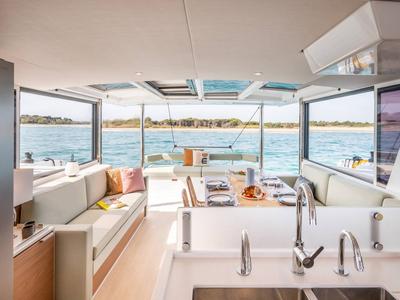Salon of Premium +, a Bali 4.6 catamaran at Sant Antoni de Portmany, Spain
