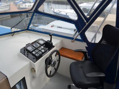 Cockpit of Lady Love, a De Drait Safari Houseboat 1050 motorboat at Drachten, Netherlands
