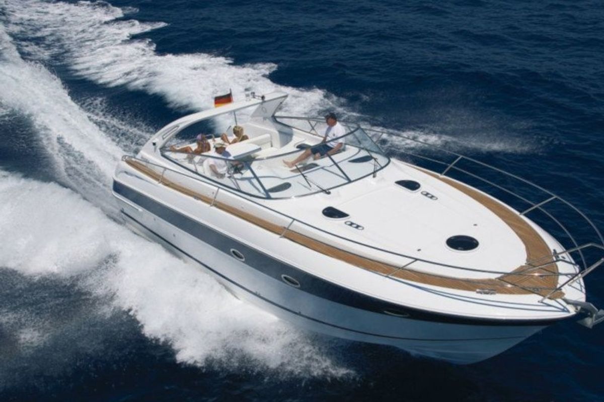 Exterior view of Ribelle, a Bavaria Sport 37 motorboat at Sant Antoni de Portmany, Spain