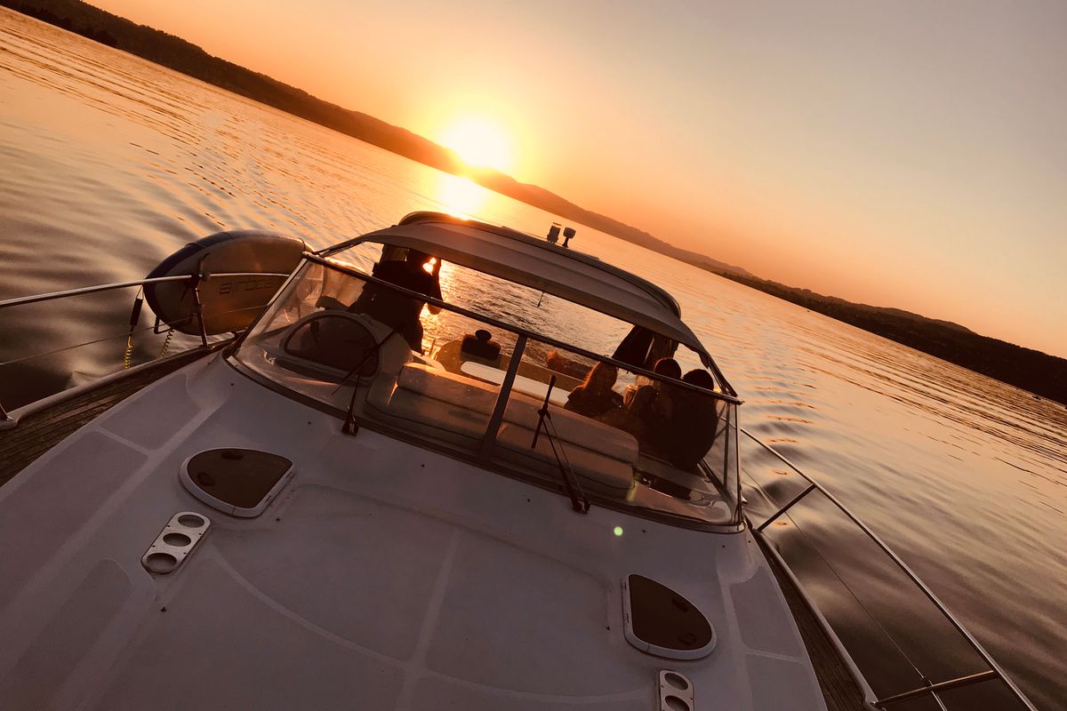Exterior view of Ribelle, a Bavaria Sport 37 motorboat at Sant Antoni de Portmany, Spain