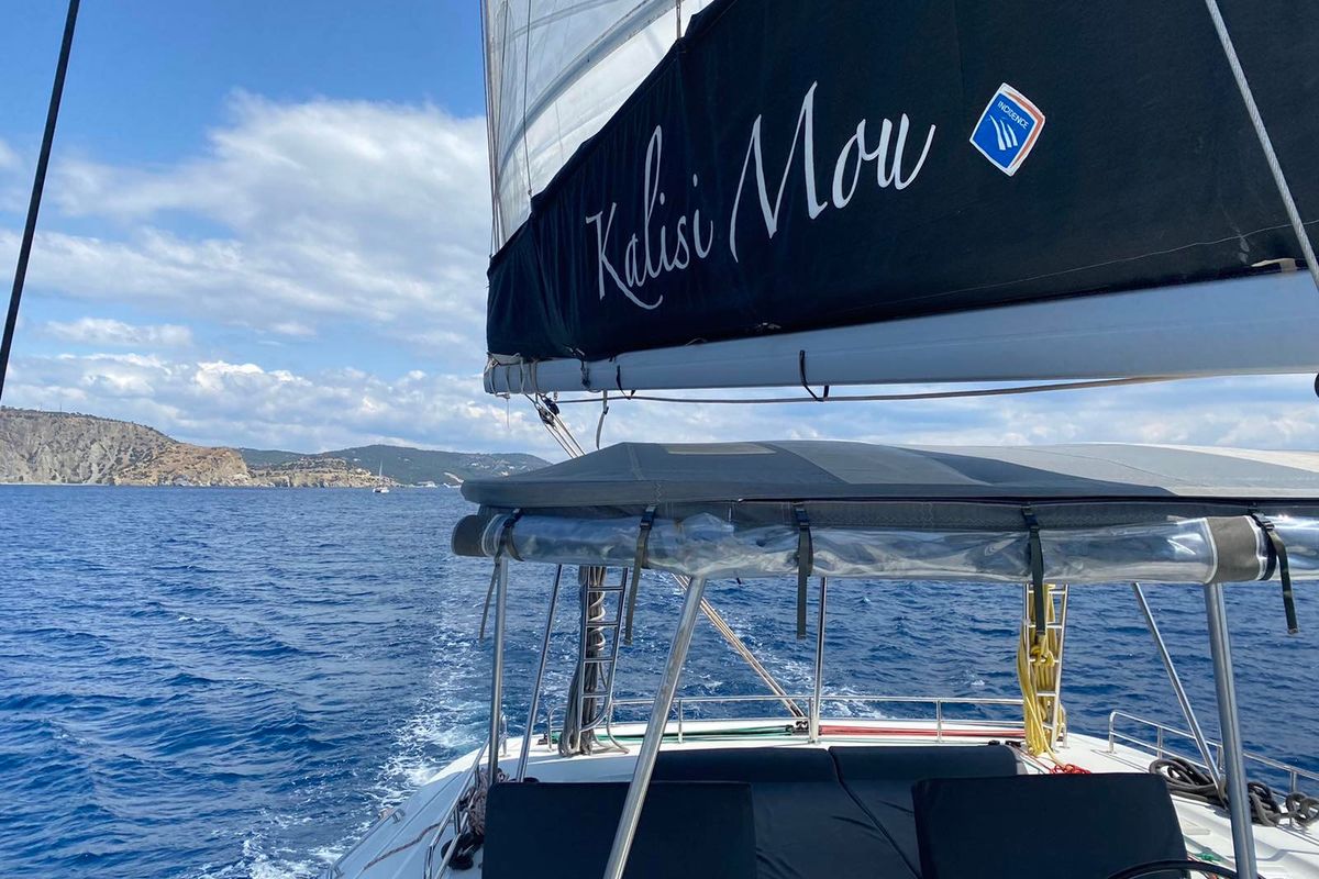 Exterior view of Kalisi Mou, a Lagoon 46 catamaran at Parikia, Greece